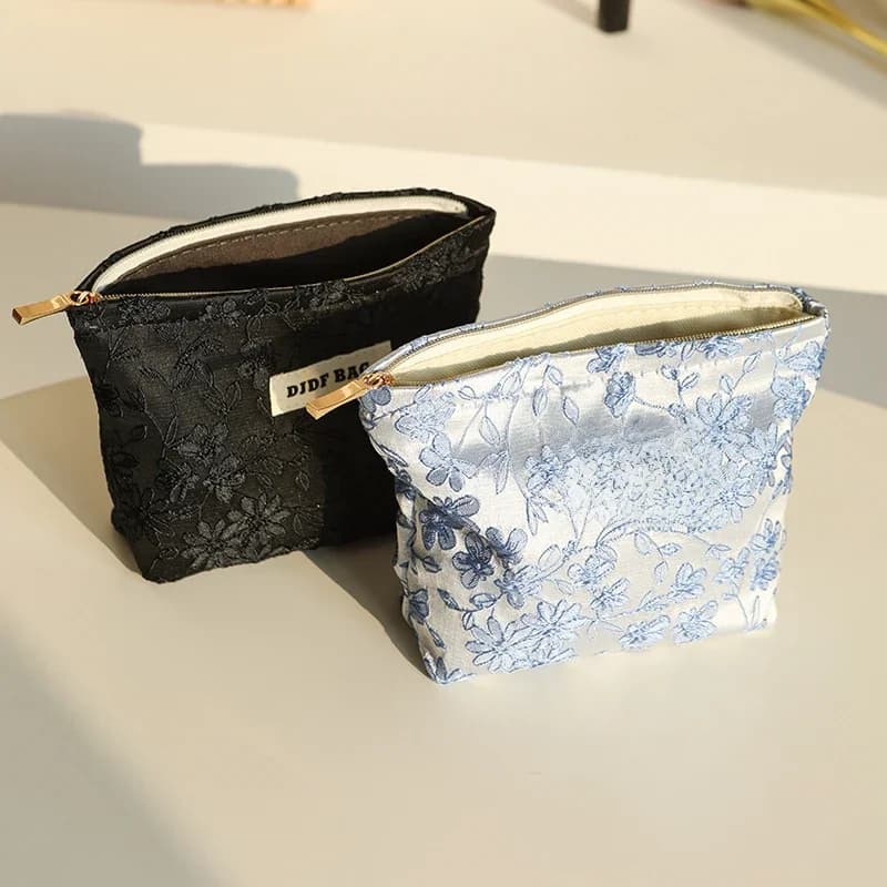 Nouveau sac cosmétique femme de petite taille Portable bleu broderie Mini sac de rangement de serviettes hygiéniques sac de clé de monnaie de