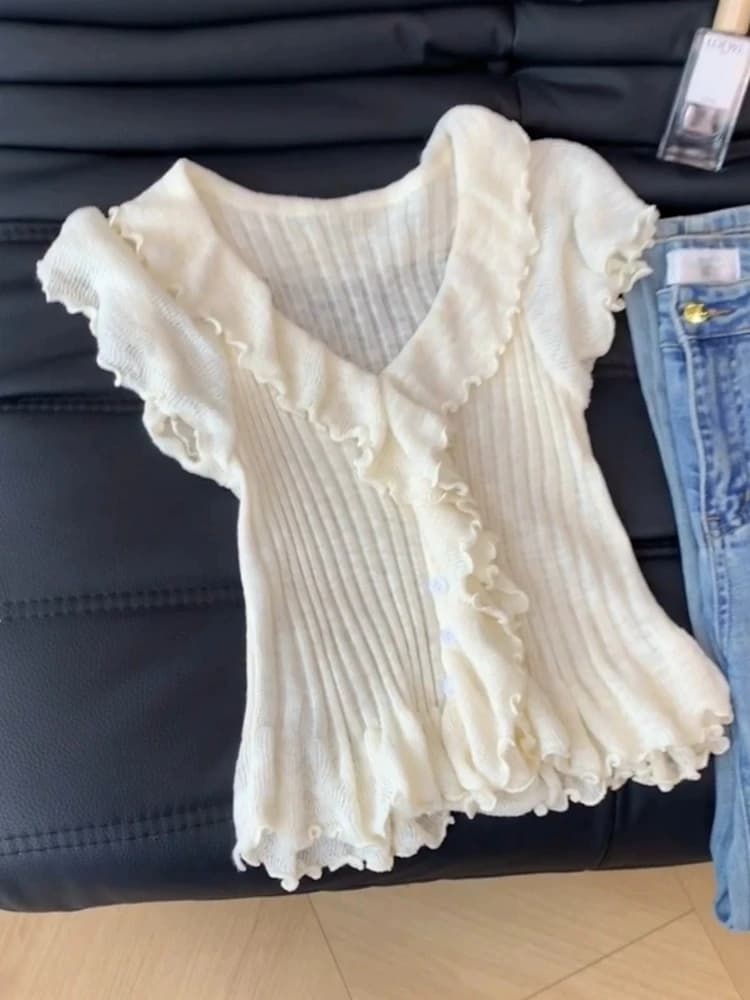 Nouvelle collection Printemps-Été : Pull court élégant à nœud papillon et cardigan uni pour femme