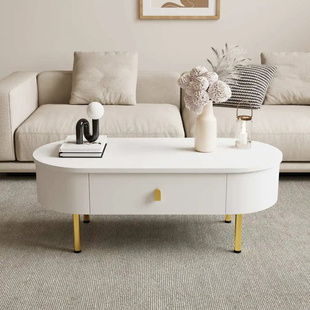 Table basse PINGGO avec deux tiroirs, poignées et pieds dorés, coins arrondis, design moderne pour salon