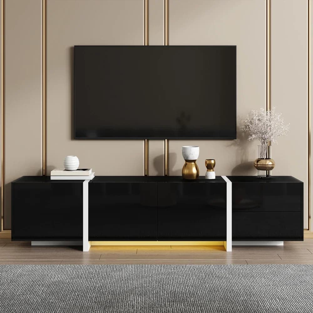 Meuble TV noir brillant avec barre lumineuse LED – Portes élégantes, tiroirs et pieds contrastés, rangement multimédia pratique