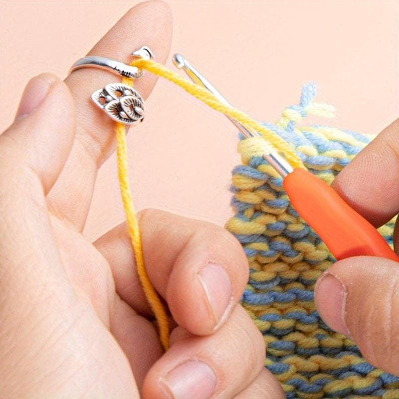 4 pièces Outils d'aide au tricot Boucle de fil à crocheter réglable Anneau de tricot à porter au doigt Dé à coudre Guide à ressort Aiguille