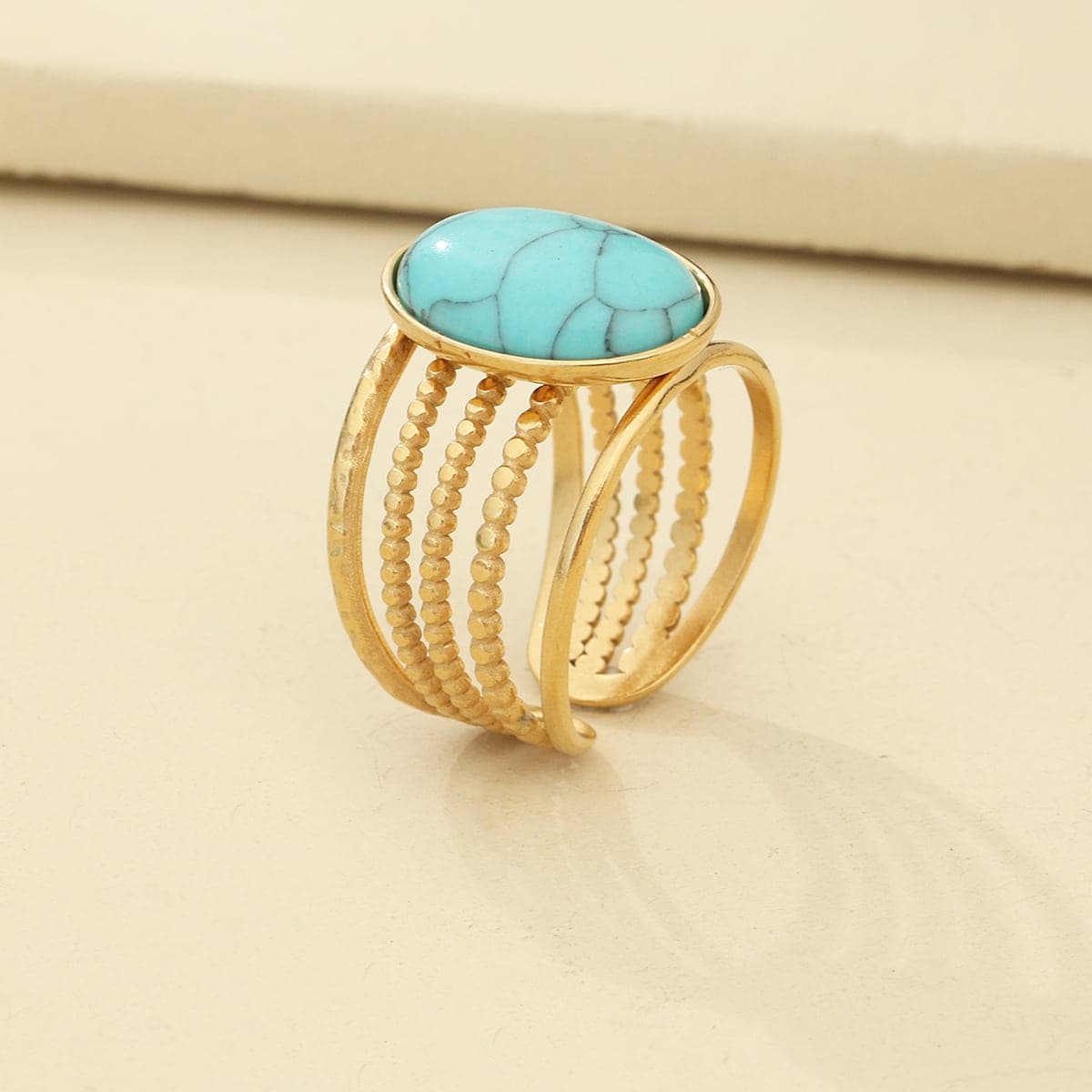 Bague ouverte à détail turquoise